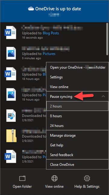 Pausing syncing settings in OneDrive.